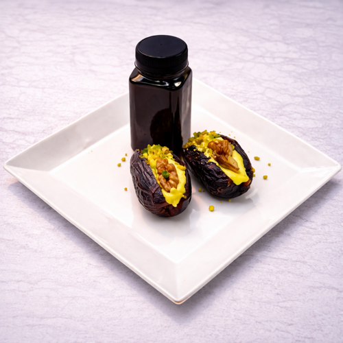 Medjool Dates stuffed with cream and nuts served with black coffee